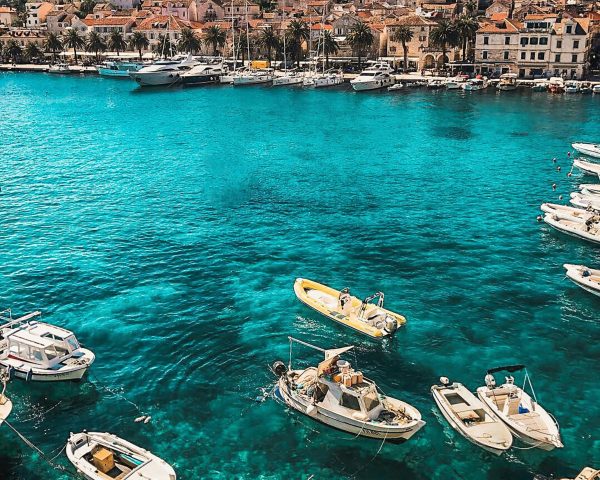 White Boats on Body of Water